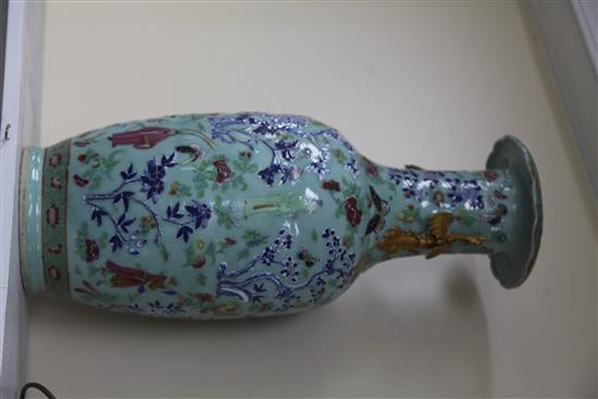 A pair of large Chinese famille rose and underglaze blue celadon ground vases, 19th century, 64cm, restoration to handles